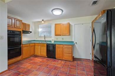 Kitchen has granite counter tops. Includes double