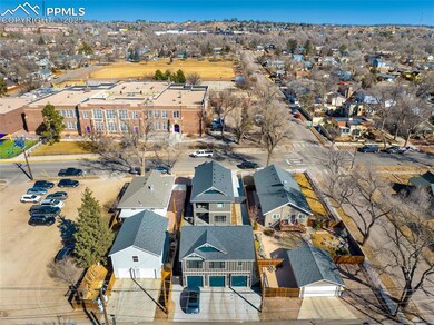 Aerial View - back of ADU with main house behind