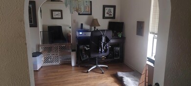 Office featuring hardwood / wood-style flooring