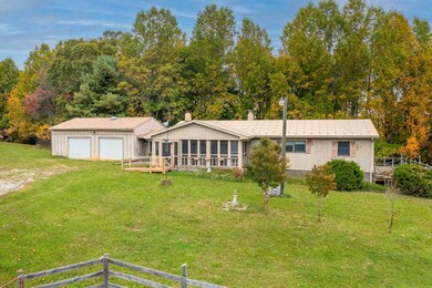 Main House with attached oversized 2 bay garage.