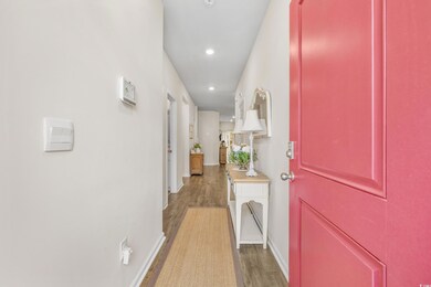 Hall featuring wood-type flooring