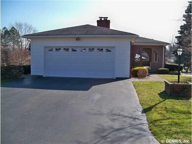 Garage A Spacious 2 Car Garage & 11 x25  Covered Front Porch