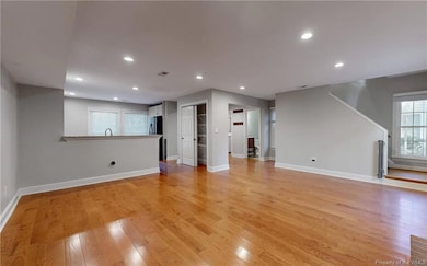This view shows the dining area and the living room area.