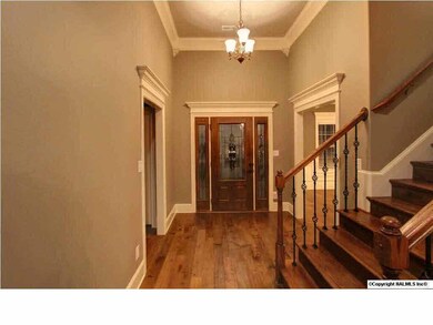 Entertainment sized kitchen every cook is sure to enjoy. Granite counter tops, custom cabinets, double oven, gas range, tiled floors, recessed lighting and glass tiled backsplash.