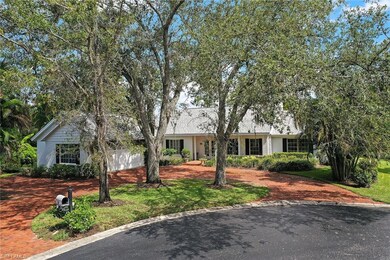 861 Swallow Point, Naples, FL 34105 - photo 2