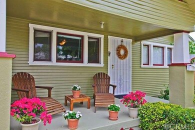 Super cute front porch...perfect spot for summer s