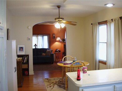 Dining room with hardwood floor.