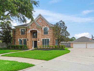Huge 3 car detached driveway allows for ample park