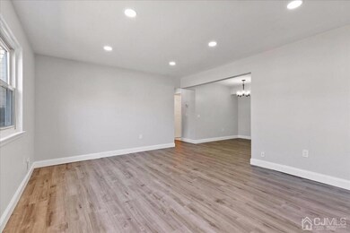Large Living Room featuring gorgeous Mohawk flooring that runs throughout the home