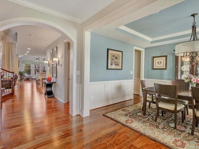 Foyer which opens to the family room, dining room and first floor office/bedroom.