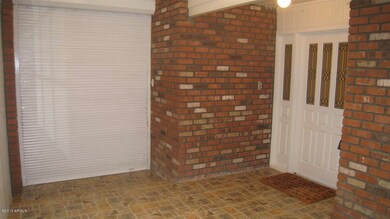 FRONT DOOR ENTRYWAY W/ROLLERSHIELD DOWN