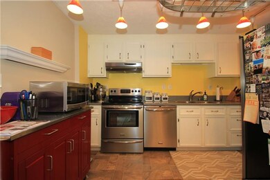 This alternate view of the kitchen provides a bett