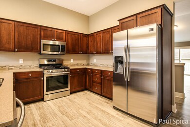 1225 Monte Rio Ct unit 62, Byron Center, MI 49315 - photo 4