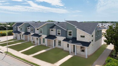 View of front of property featuring stone siding,
