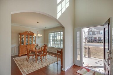 Full light entry door opens to 2 story foyer.