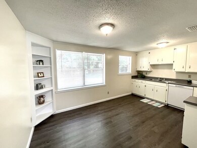 Kitchen w room for island or table
