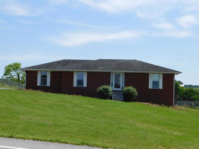 ALL BRICK HOUSE WITH ATTACHED AND DETACHED GARAGE 