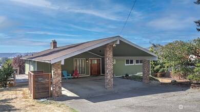 Covered entry and parking with acccess to side yard.