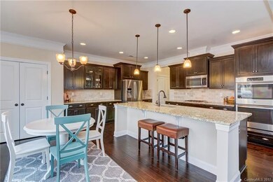 Large eat-in kitchen with additional seating at th