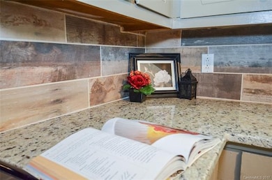 GRANITE and beautiful backsplash!
