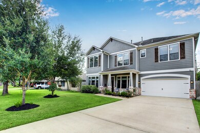 A large double-wide driveway allows for additional
