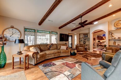 Lovely living room with beamed ceilings!
