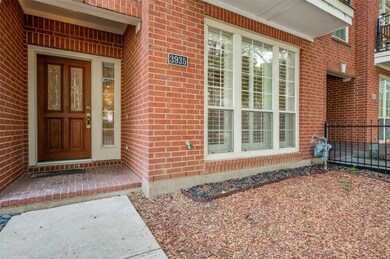 Doorway to property featuring brick siding