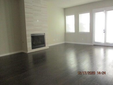 Great living room with wall of windows and French 