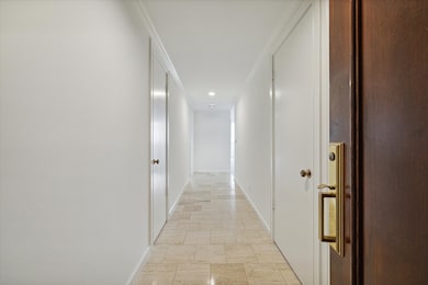 Entry foyer- Light and bright with travertine marb