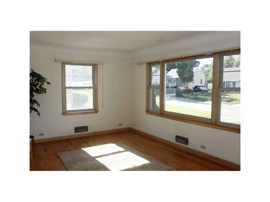 Living Room. Features hardwood floor, plastered wa