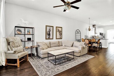 The open floor plan is bright and sunny! The rooms