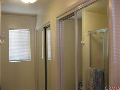 Master bathroom double closets in the single story