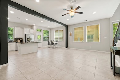 Spacious open-concept living area ideal for hostin