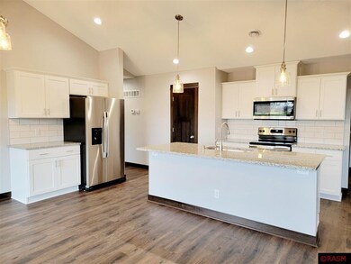 Listing pictures are of a previous model with simi