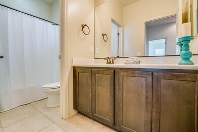 Upstairs bathroom with dual sinks