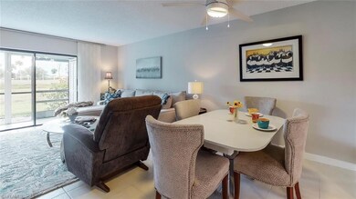 Large area rug complements the gray, white and blu
