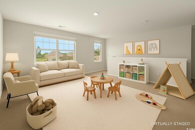 Living room featuring carpet flooring and recessed lighting