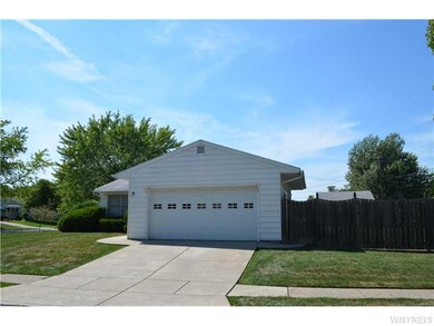 Exterior Front. ATTACHED 2 car garage with newer concrete driveway.