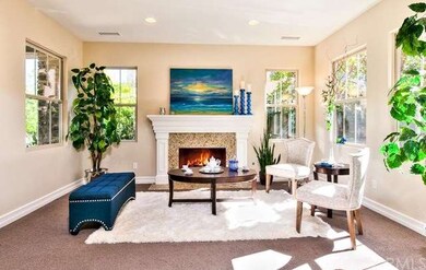 Formal Living room with cozy Fireplace.