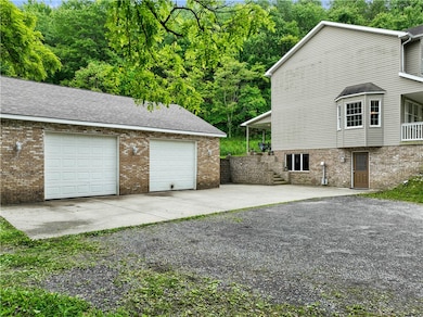 Huge detached garage with radiant heat flooring an