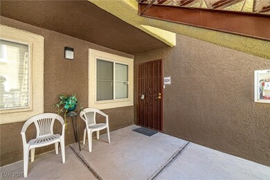 Doorway to property with stucco siding