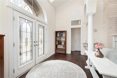 Gorgeous two-story entryway loaded with natural light, amazing trim and arch details. Don�t miss the incredible double crown molding, vaulted ceilings, new light fixtures, light medallions. All this and beautiful elegant styling from shabby chic to classic farmhouse.