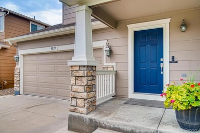 A sprawling front porch greets your guests as they