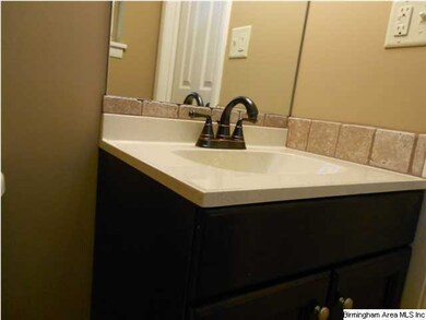 Master 1/2 bath with designer sink & oil rubbed br