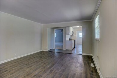 Dining area view into huge family room and kitchen