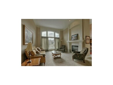 Impressive Living Room with see-thru fireplace