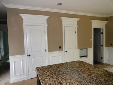 Note the exquisite trim work throughout the downstairs