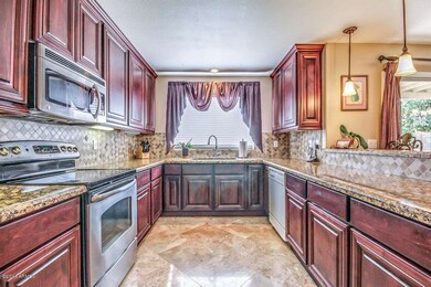 Kitchen Overlooking Back Yard & Lake