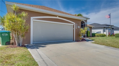 View of front of house with garage screen down