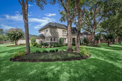 The corner lot is shaded by mature Oak trees and flowering Crape Myrtles, which will only grow more beautiful as the years pass.